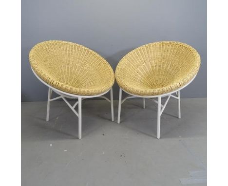 A pair of mid-century style rattan cone chairs designed by Terence Conran on white enamel steel base. 