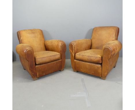 A pair of French leather-upholstered club arm chairs.Some marks and abrasions to leather. Some cracking also. Stains to one s
