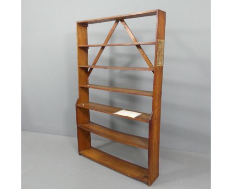 A pine six-shelf open bookcase. 94x152x20cm. Good used condition, some bowing to the shelves and minor wear. From the library