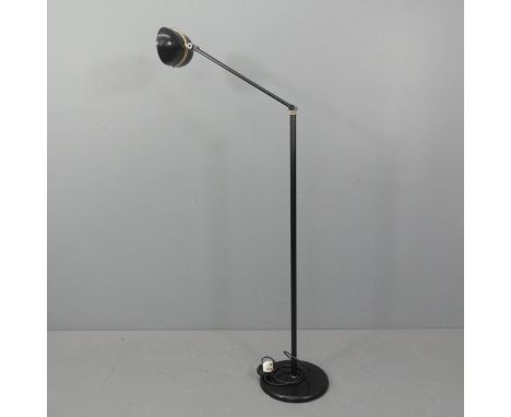 A 1980s Italian uplighter floor standing lamp by Relux Milano in black painted steel and brass, in working order with LED bul