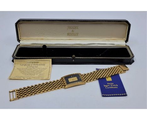 A Brooks &amp; Bentley "The gold ingot watch" gold plated gentleman's quartz bracelet watch, having 25mm wide rectangular cas