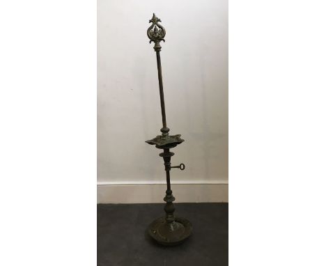 A 20th century Indian brass adjustable floor standling lamp,&nbsp; height 117cm.