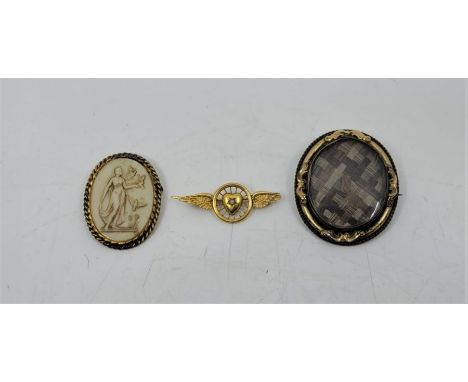 A 15ct. gold sweetheart brooch, set pearl to central heart, stamped Rd.No. and 15ct. (gross weight 2.8g) (as found), together