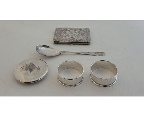 A pair of silver napkin rings, by Douglas Pell Silverware, Birmingham 1993, in box, together with white metal and niello work