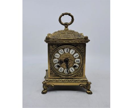 A Franz Hermle &amp; Sohn gilt brass mantle clock, gong strike, signed to movement plate, having white enamel chapter ring wi