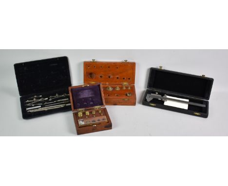 Two Cased Sets of Scientific Weights together with a Cased Drawing Set and a Cased Vernier Scale