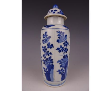 Chinese porcelain blue and white vase and lid with flowers-Marked-Kangxi. Height 22 cm. The vase in good condition, The cover