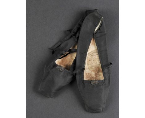 *Victoria (Queen of Great Britain & Ireland, 1819-1901). A pair of satin shoes worn by Queen Victoria, black satin shoes with