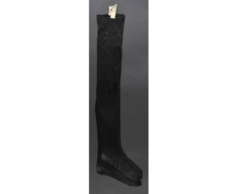 *Victoria (Queen of Great Britain & Ireland, 1819-1901). A pair of silk stockings worn by Queen Victoria, black silk stocking