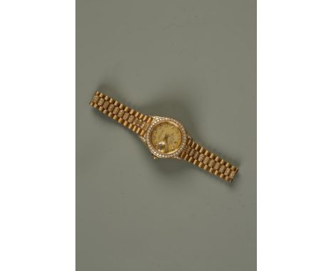 ROLEX: A LADIES 18CT YELLOW GOLD AND DIAMOND-SET WRISTWATCH, the champagne round dial set with diamond numerals, sweep second