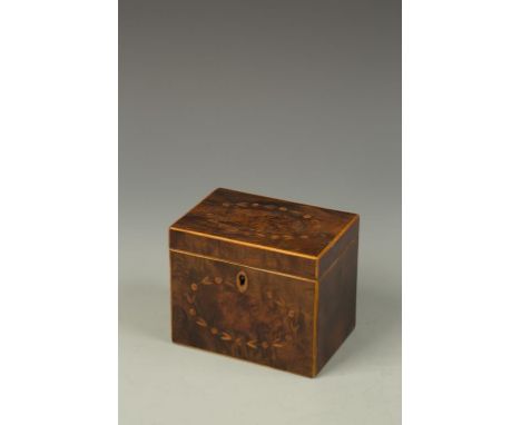A SMALL GEORGE III INLAID BURR WOOD TEA CADDY, of rectangular form, the lid and front decorated with foliate wreaths, the int
