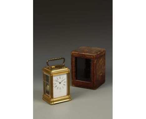 DROCOURT: A FRENCH BRASS GORGE CASED REPEATING CARRIAGE CLOCK, the white enamel dial with Roman numerals and outer Arabic sec