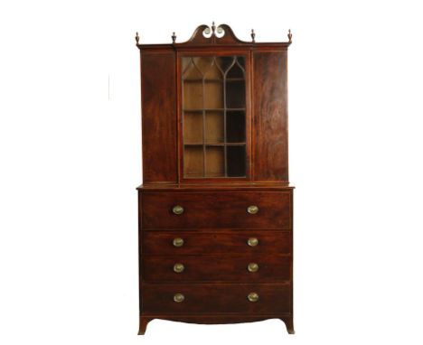 ATTRIBUTED TO GILLOWS OF LANCASTER: A GEORGE III MAHOGANY SECRETAIRE CABINET, the upper section with a scrolling cornice abov