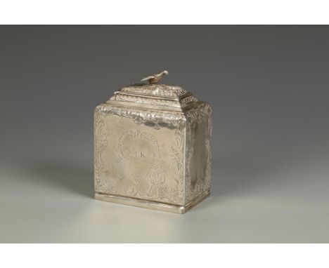 A GEORGE II TEA CADDY of shaped square form, with a stepped rectangular hinged cover and bird finial, the body chased with ch