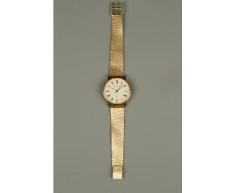 BUECHE-GIROD: A GENTLEMANS 18CT YELLOW GOLD SLIM WRISTWATCH, the round dial with Roman numerals, clear stone at 12 o'clock, s