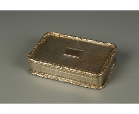 A GEORGE IV SILVER GILT SNUFF BOX of rectangular form with a raised foliate border, engine-turned decoration and vacant recta