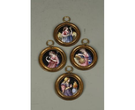 A SET OF FOUR ENAMEL PLAQUES of the four seasons, polychrome painted females depicting the seasons in gilt metal frames, 19th