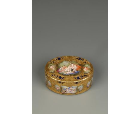 A PARIS ENAMELLED GOLD TABLE SNUFF BOX, oval box, the cover, sides and base chased with trailing Rococo scrollwork, the cover
