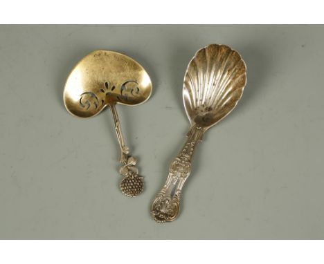 TIFFANY & CO: A SILVER GILT CADDY SPOON with heart-shaped pierced bowl and leaf and strawberry finial, the reverse of the bow