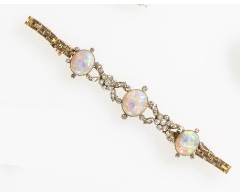 A BELLE EPOQUE OPAL AND DIAMOND BRACELET millegrain collet-set in yellow gold with three opal cabochons, each bordered with s