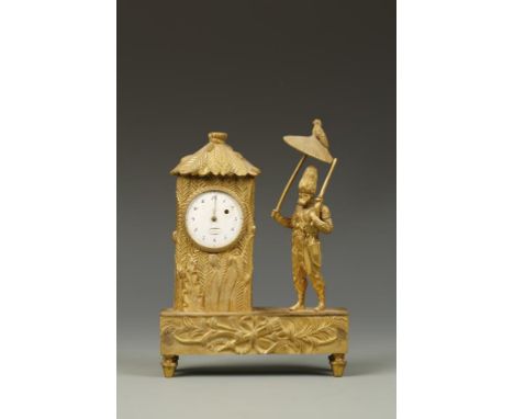 A GILT METAL MANTEL CLOCK with a white enamelled watch movement signed "Augustin Jousserandot" with single winding hole, the 