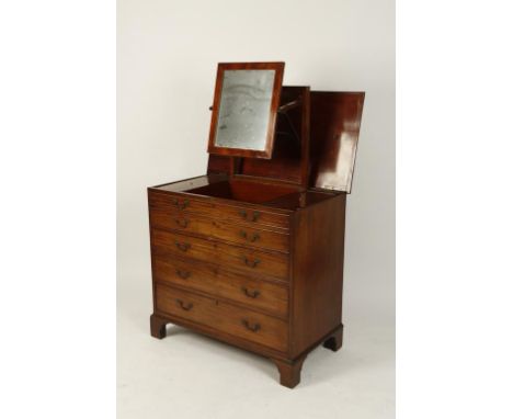 A GEORGE III MAHOGANY DRESSING CHEST OR WASH STAND with a rising rectangular top with moulded border, opening to an interior 