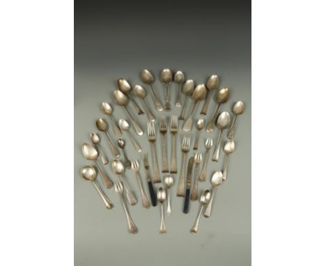 A SET OF FOUR GEORGE III IRISH TABLE FORKS of Old English pattern, crested, by IB, Dublin 1798, 8" long, and a quantity of 18