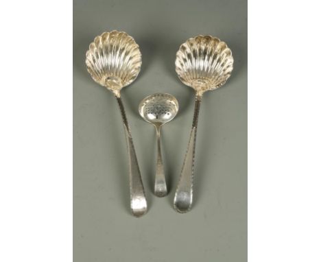 A PAIR OF GEORGE III OLD ENGLISH PATTERN SAUCE LADLES with feather edge decoration, crested, marks stretched, possibly London