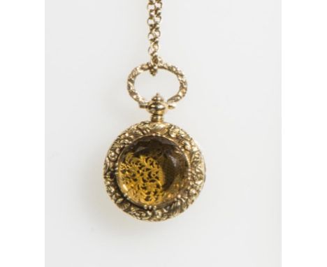 AN EARLY 19TH CENTURY YELLOW METAL VINAIGRETTE LOCKET PENDANT, set to the centre to the centre with a round-cut citrine surro