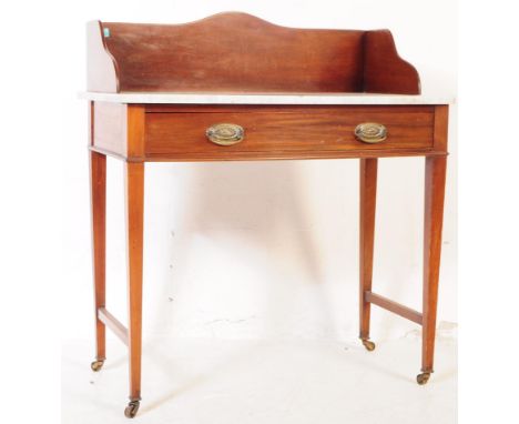 A 20th century Edwardian mahogany and white marble bow front hall console table. Raised on squared legs united by stretchers 