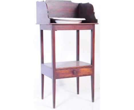 A 19th century George III mahogany pedestal washstand. Raised on squared legs with upright body having lower tier. Above, a p