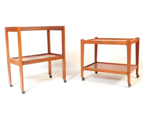 Two mid 20th century tile topped teak cocktail drinks serving trolleys. The larger trolley being raised on a squared teak fra