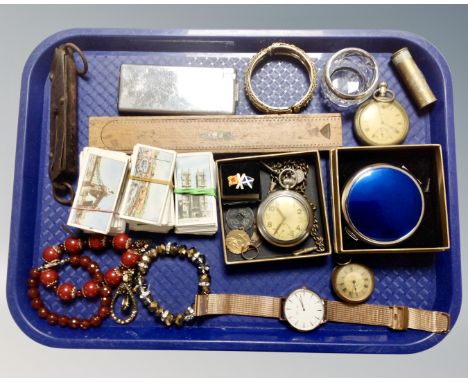 A tray containing a cut glass silver rimmed salt, assorted pocket watches, lady's bracelets and bangles, pocket balance scale