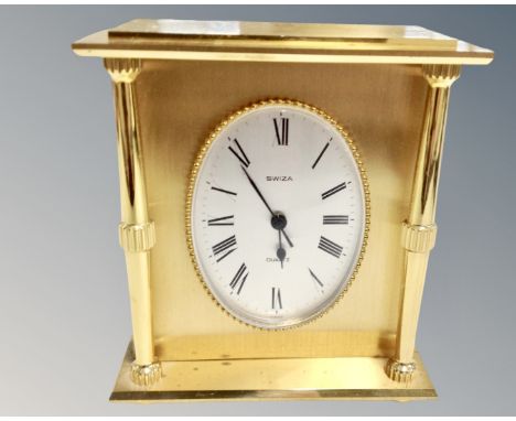 A Swiza heavy brass carriage clock, with quartz battery movement.