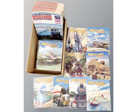 A box containing vintage Meccano magazines.