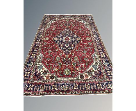 A Tabriz carpet, Iranian Azerbaijan, 198cm by 294cm.