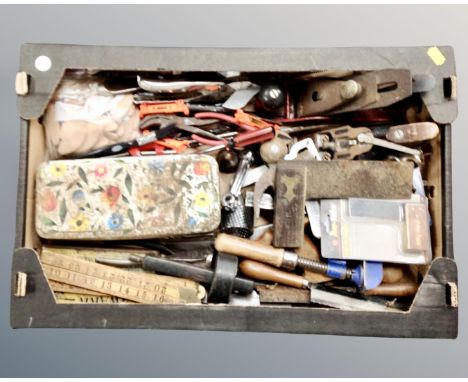 A box containing a good selection of vintage and later hand tools including chisels, screwdrivers, clamps, planes, boxwood ru
