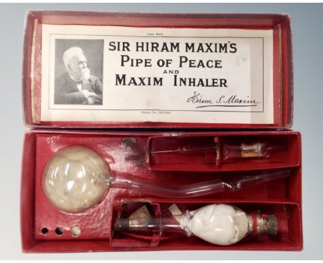 A vintage Sir Hiram Maxim's Pipe of Peace and Maxim inhaler, in original box.