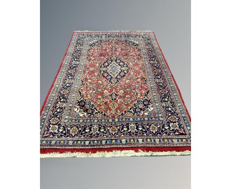 A Keshan carpet, Central Iran, 203cm by 292cm.