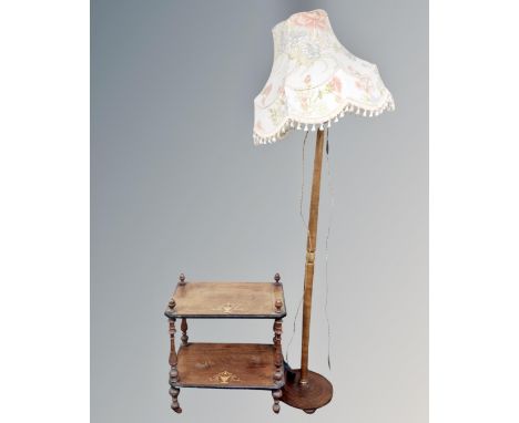 A Victorian inlaid two tier whatnot stand together with a beechwood standard lamp with shade.