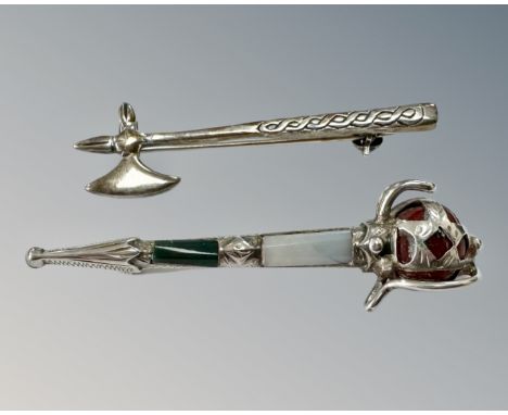 A Scottish silver and agate mounted broadsword brooch, length 49mm, together with a silver axe brooch. (2)