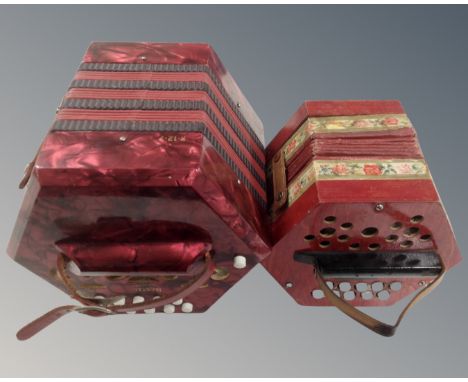 A vintage Italian Bastari 20 key concertina together with a further vintage German 20 key concertina.