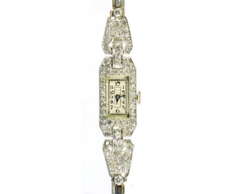 AN ART DECO DIAMOND SET PLATINUM COCKTAIL WATCH, CIRCA 1935, THE EXPANDING WHITE GOLD BRACELET MARKED 18CT, 16.2G