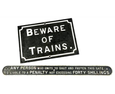 RAILWAYANA.  TWO CAST IRON SIGNS - BEWARE OF TRAINS AND ANY PERSON WHO OMITS TO SHUT AND FASTEN THIS GATE..., 56CM AND 102CM 