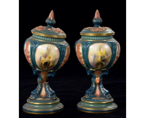 A PAIR OF HADLEY'S WORCESTER POT POURRI VASES AND RETICULATED COVERS DECORATED WITH FLOWERS ON TRIPLE DOLPHIN FOOT (ONE DAMAG