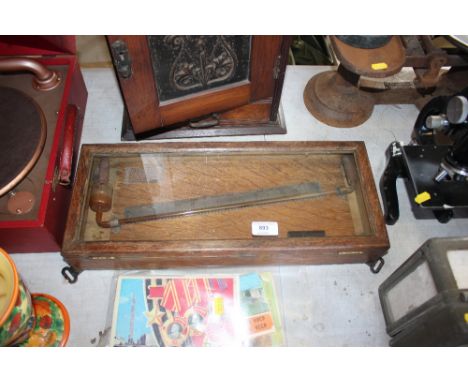 A vintage oak cased Negretti &amp; Zambra water pressure gauge
