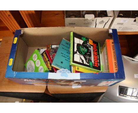 A box containing various projector films 