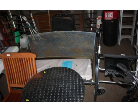 A metal bench and cushion 