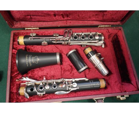 A cased Rudall Carte clarinet