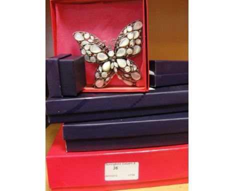 A quantity of boxed Butler & Wilson dress jewellery to inc a silver butterfly; together with V&A boxed jewellery by Michael M